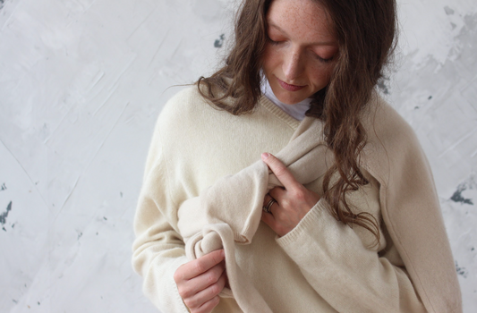 Woman wearing cream cashmere jumpers
