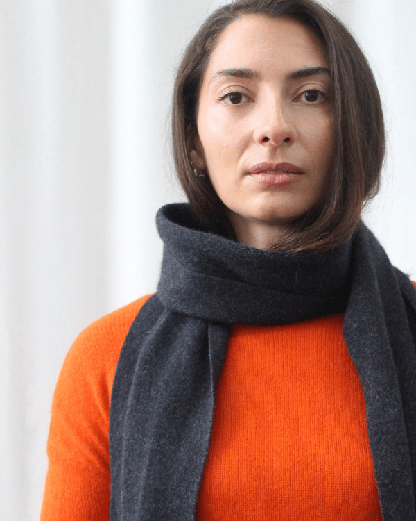 Woman wearing secondhand cashmere grey scarf