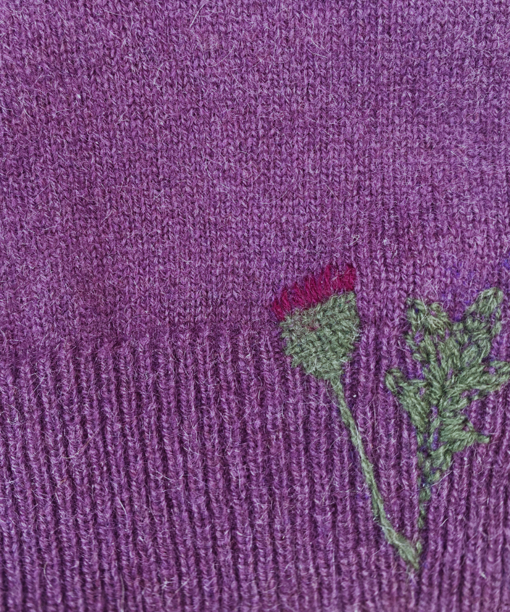 Visibly mended cashmere knitwear