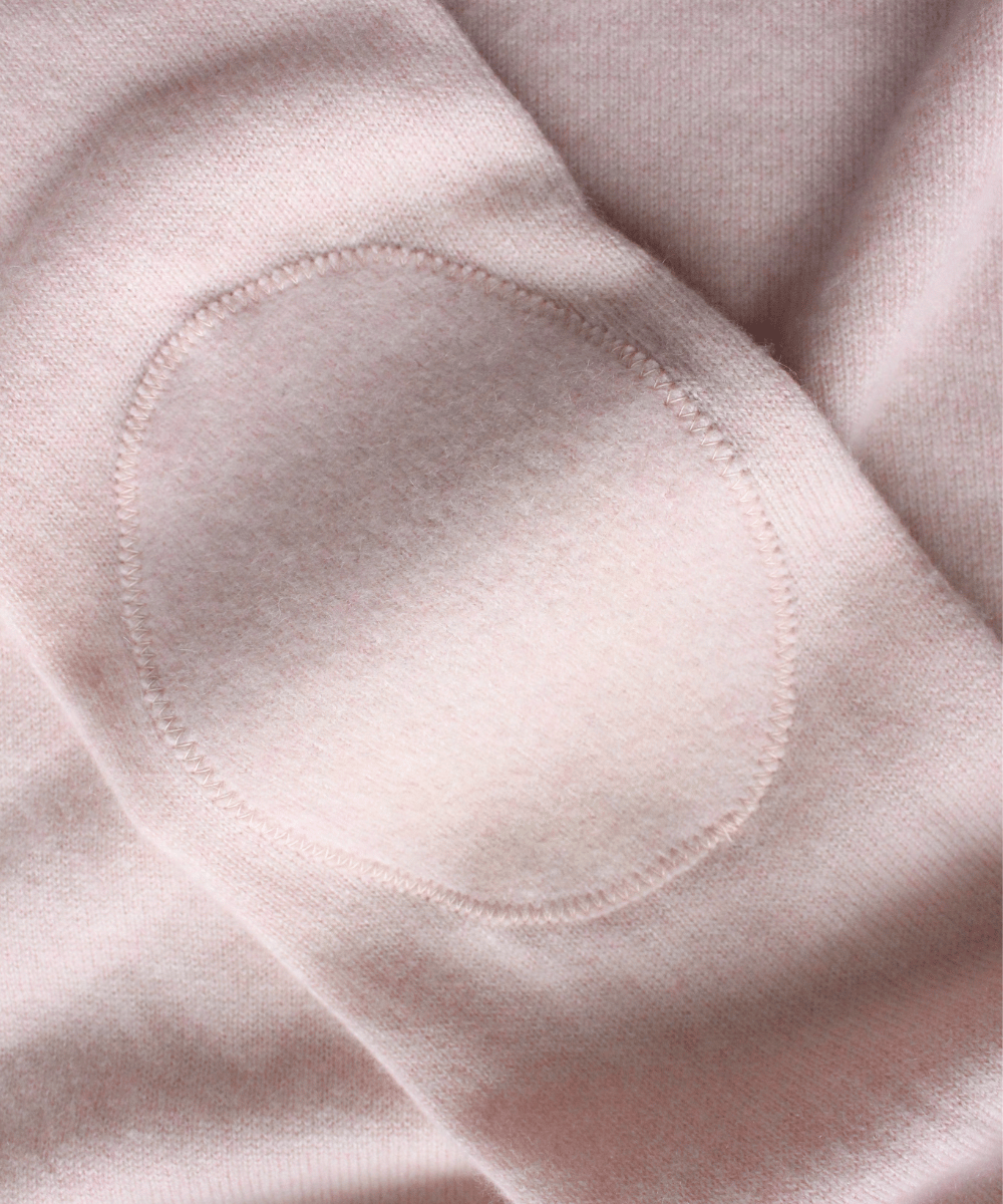 Reclaimed cashmere elbow patch on a jumper