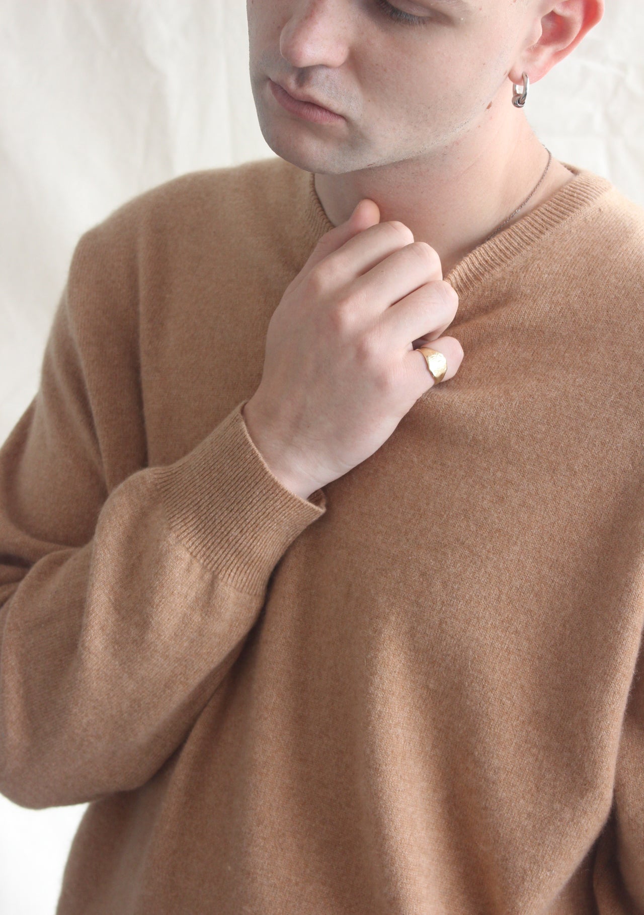 Man wearing secondhand cashmere jumper