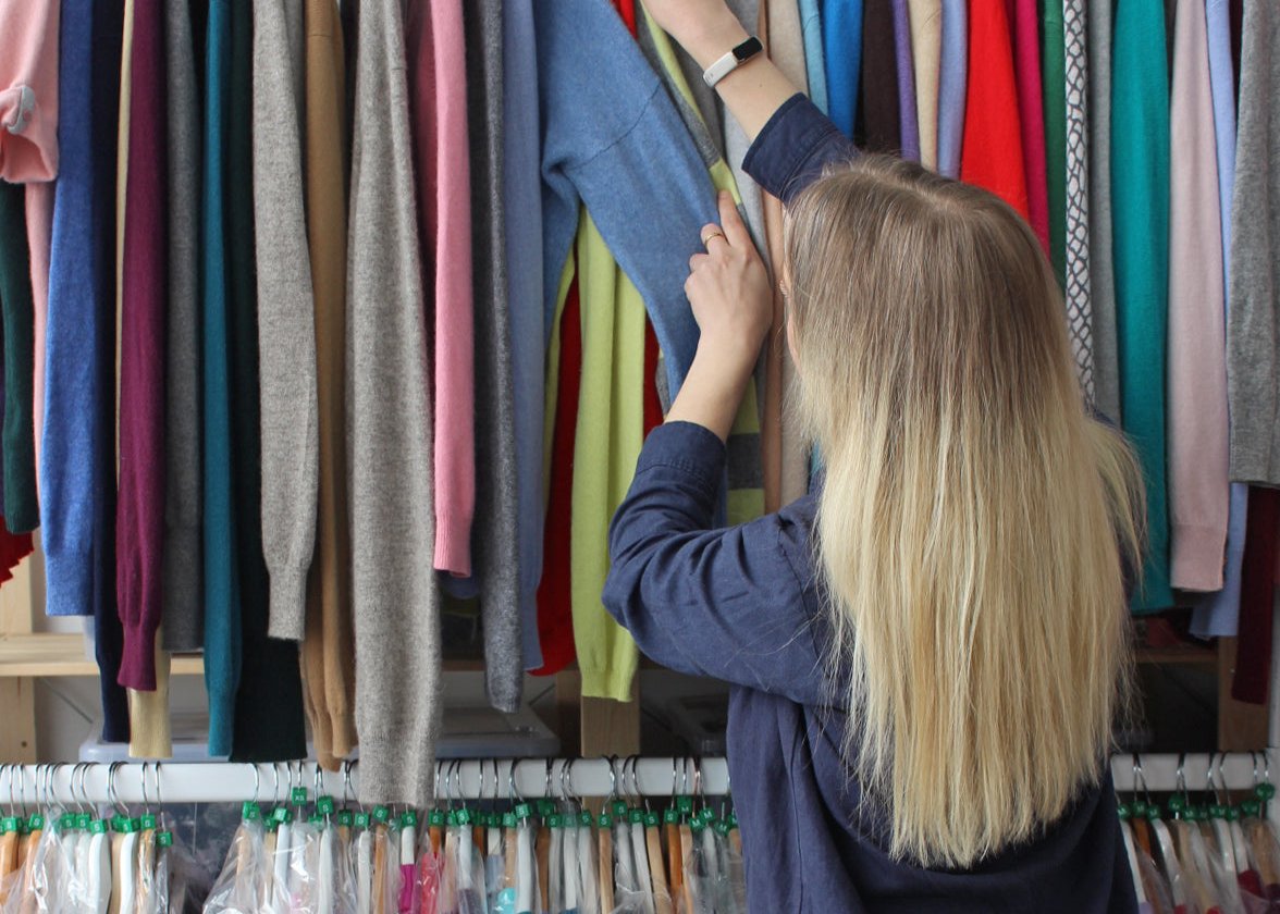 Lotti looking through clothes