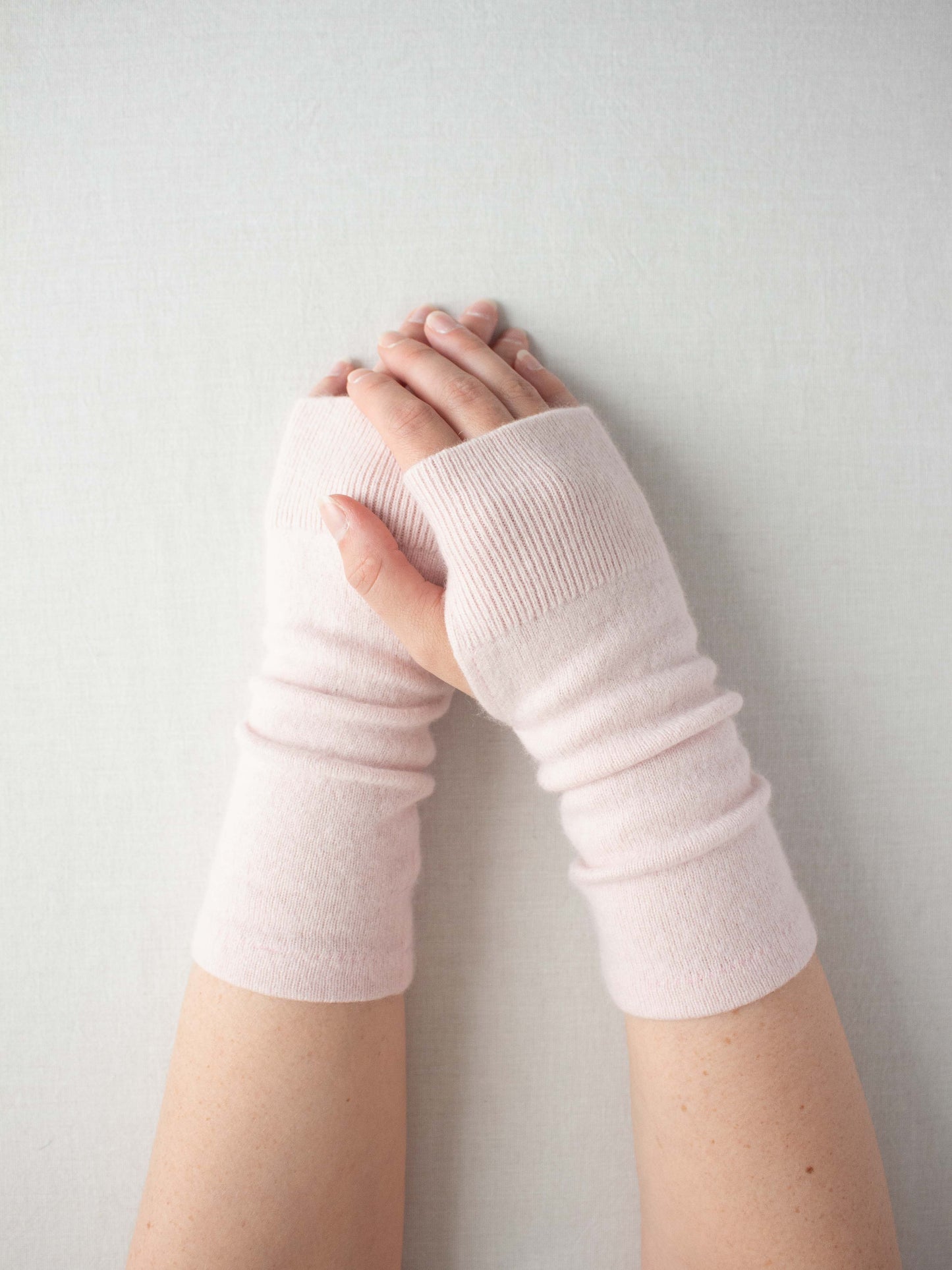 Recycled cashmere hand warmers