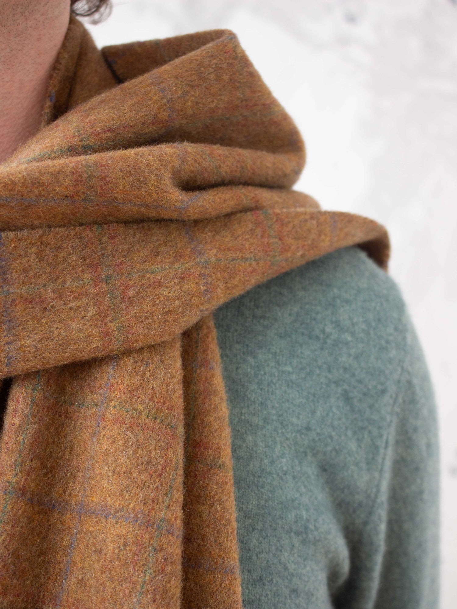 Man wearing secondhand cashmere scarf